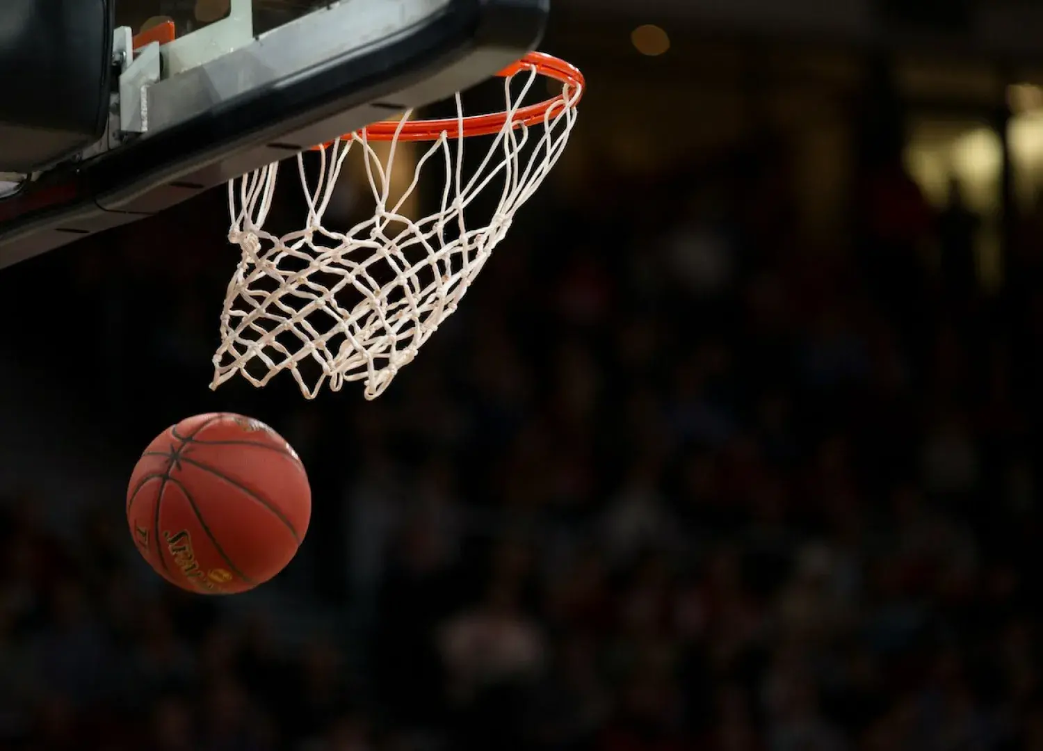 Basketball going in hoop