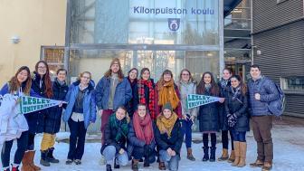 Group picture in front of school building in Finland.