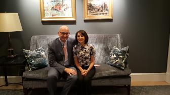 Chris Gaffney and Karen Kames sit together on a couch.