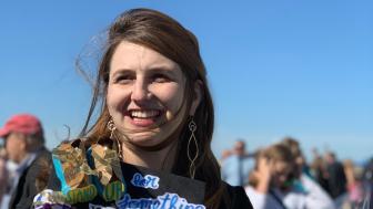 Katya Zinn is pictured smiling amid the crowd at Lesley Commencement