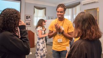 Senior Chord Shariffe speaks with freshmen at Student Transition Weekend.