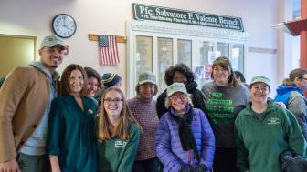 group photo inside a building after volunteering
