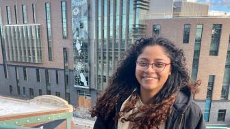 Natalia Reyes with a view of Boston Arts Academy behind her