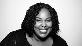 Headshot of author Renee Watson in a black shirt