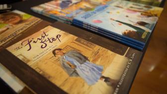 Susan Goodman's picture book, "The First Step," is on a table.