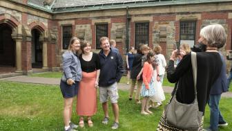 students pose for photos