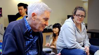 Seniors and students collaborate in user design class.