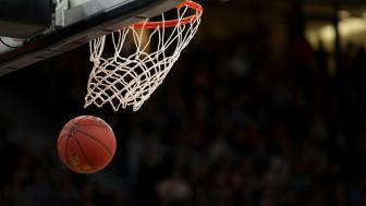 Basketball going in hoop