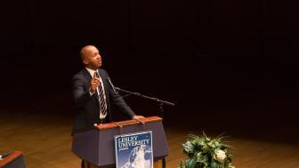 Bryan Stevenson speaks at the podium