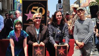 Donna Halper with the band Rush