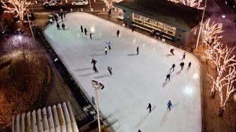 Aerial photograph of Kendall Square Skating Rink at night.