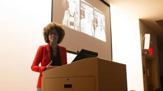 Latoya Ruby Frazier speaks at a podium.