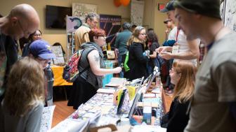 Massachusetts Independent Comics Expo tables, books, exhibitors, and visitors