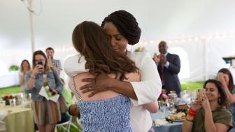 Ayanna Pressley hugs Sarah Groh