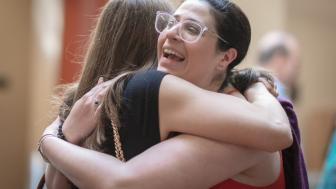 Threshold alumni embrace