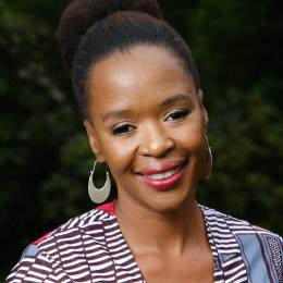Photograph of Thato Mwosa smiling facing the camera