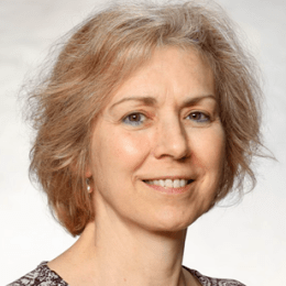 Susan smiling against white background