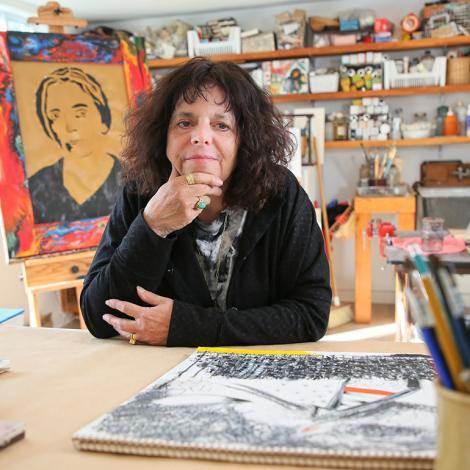 A photo of Expressive Therapies Professor Karen Frostig in an art studio.