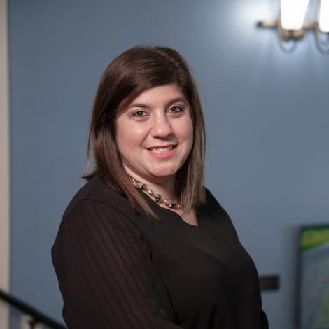 photo of Amanda smiling in a black shirt