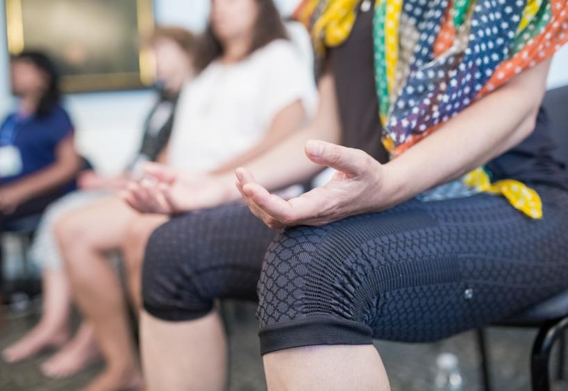 Students engaged in mindfulness poses