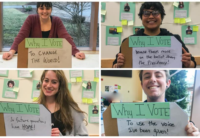 4 students hold why I vote signs saying to change the world, because there's more on the ballot than the presidency, so future generations have hope, to use the voice I'v been given