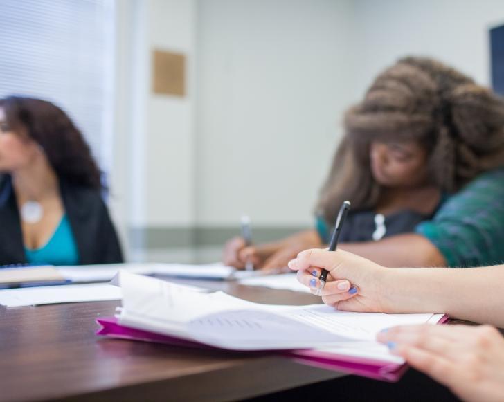 a student writing in class