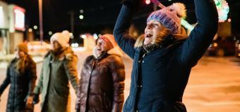Sarah Harmon '12 leads Boston moms in a "primal scream"