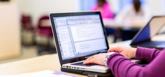 student working on a laptop