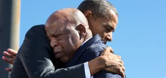 Barack Obama hugs John Lewis