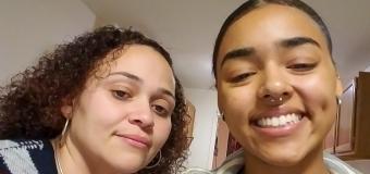 Carolina and Dejah in the present. Smiling at the camera.