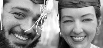 A black and white selfie of Elizabeth Areizaga in her cap and gown. 