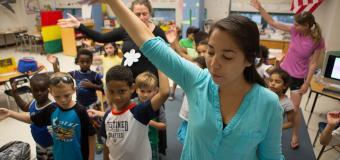 Teacher at the head of the classroom