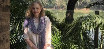 Photograph of Jane Richardson in front of plants