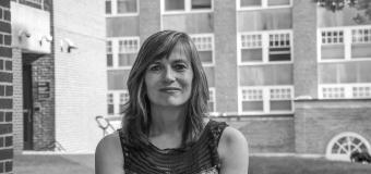 laurie foos black and white, sitting outside on doble quad