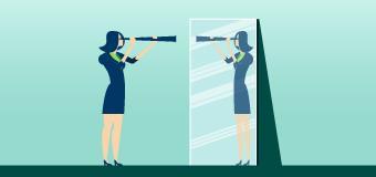 Woman looking in mirror. 