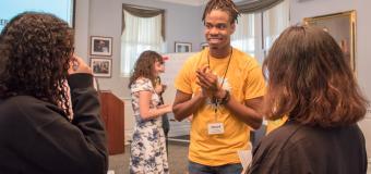 Senior Chord Shariffe speaks with freshmen at Student Transition Weekend.