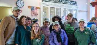 group photo inside a building after volunteering