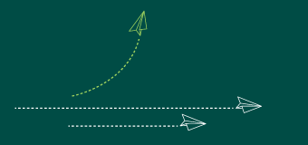 A paper airplane veers away from the others. 