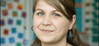 Headshot of Sydney Chaffee, appears to be in a classroom