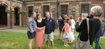 students pose for photos