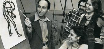 students listen and laugh with drawing instructor in studio circa 1978