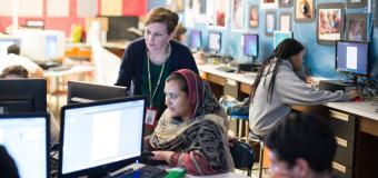 digital art teacher with student