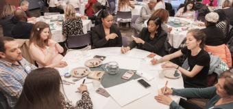 people gathered around tables