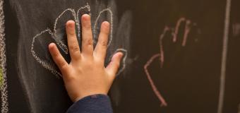 hand with chalk outline Center for Special Education