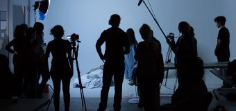 film students shoot a scene in class
