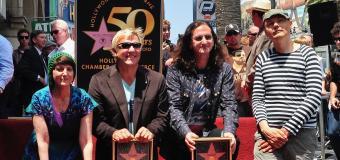Donna Halper with the band Rush