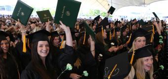 large crowd of graduates celebrating