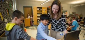 holly doe works with students