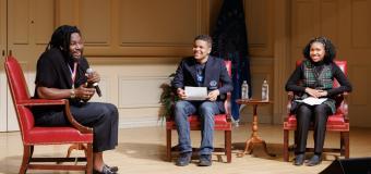 jason reynolds and two teenage students on a stage
