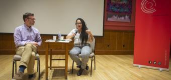 Dr. Tatiana Cruz and her co-host sitting at a table, presenting